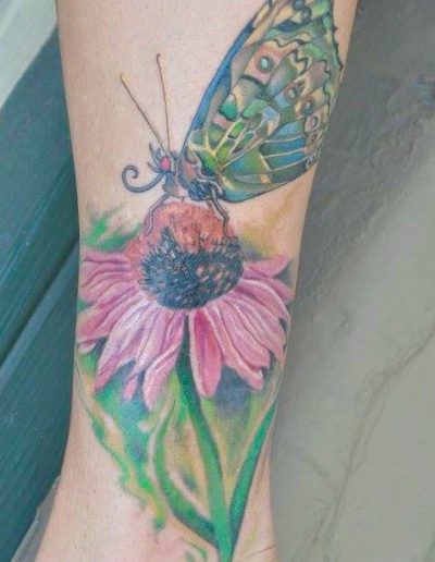 Realistic flower tattoo, flower tattoo, realistic butterfly tattoo, st Augustine tattoo