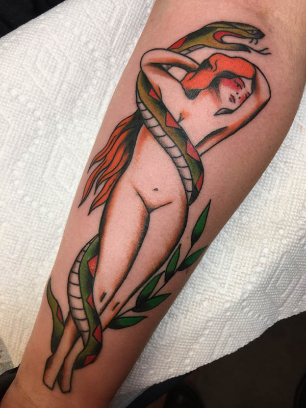 Traditional lady tattoo , lady with snake tattoo, pin up tattoo, traditional tattoo st Augustine