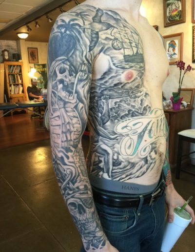 black and grey pirate sleeve , full sleeve with side piece tattoo, black and grey tattoo artist , st augustine tattoo shop