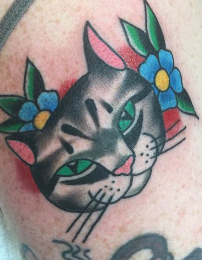 Cat tattoo, traditional cat tattoo, st Augustine tattoo artist , Jesse britten