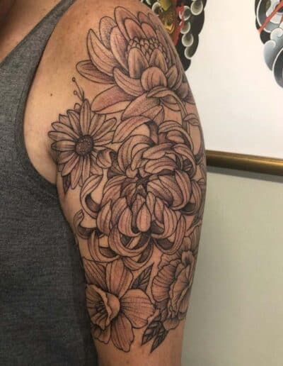 flowers tattoo , black and grey , statue tattoo , St Augustine tattoo artist