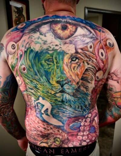 back color Tattoo - lion, eye, peacock feathers