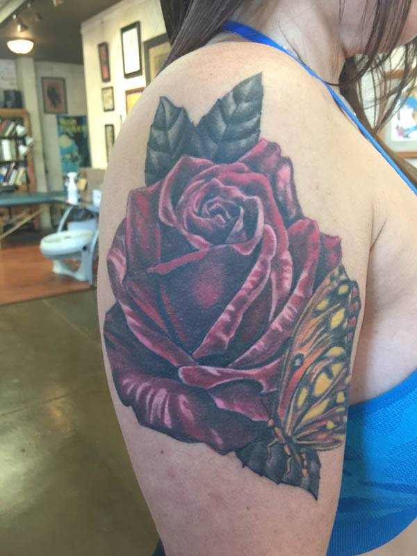 Realistic rose tattoo , st Augustine tattoo , rose tattoo st Augustine , jesse britten